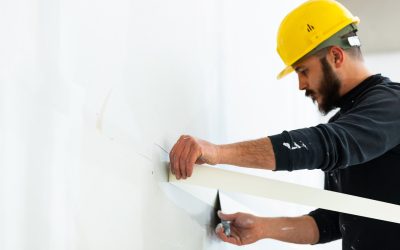 worker-plastering-gypsum-board-wall-2021-08-26-18-36-57-utc-min
